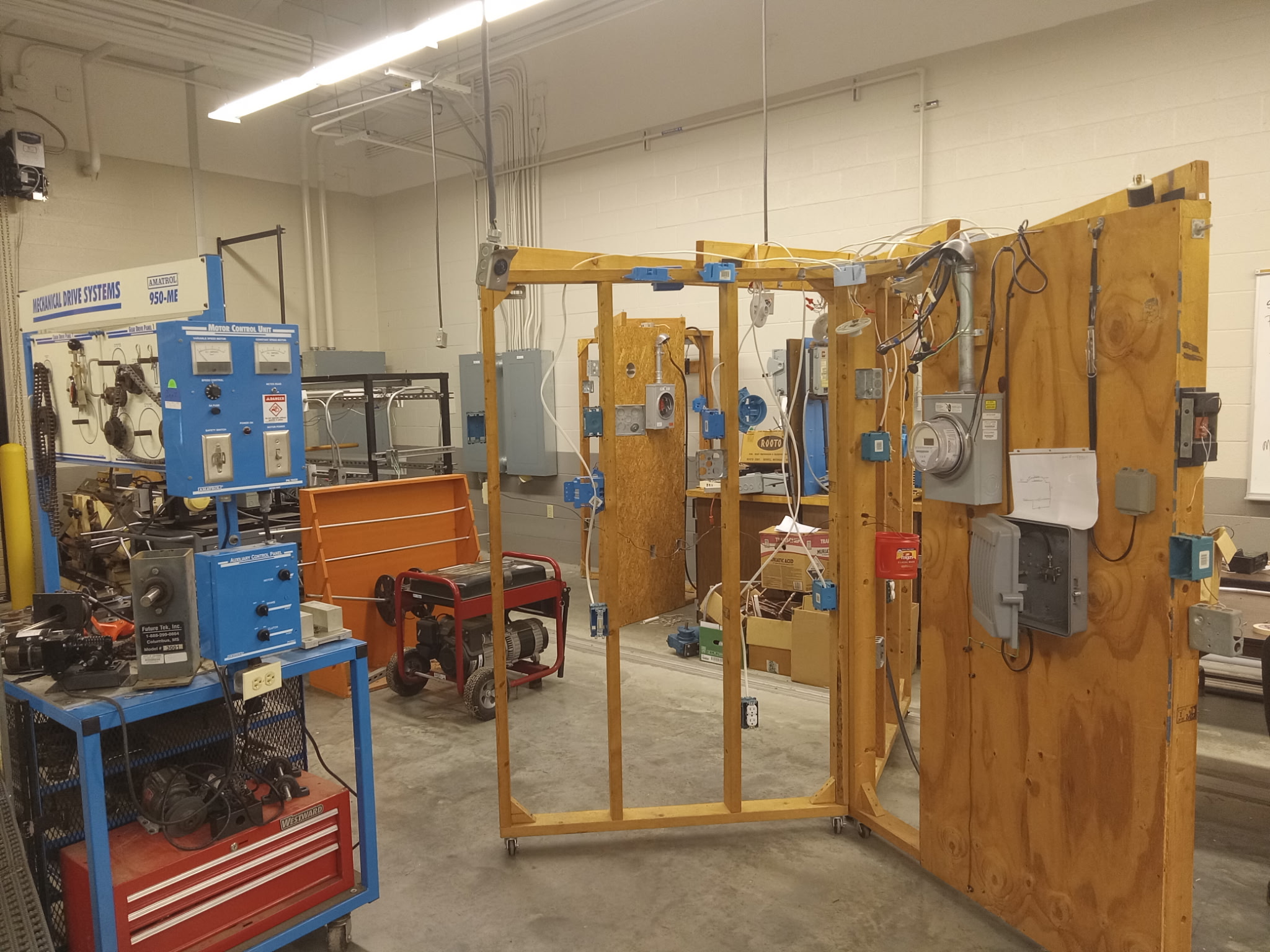 Mechanical drive systems and motor control training panels in the electrical lab