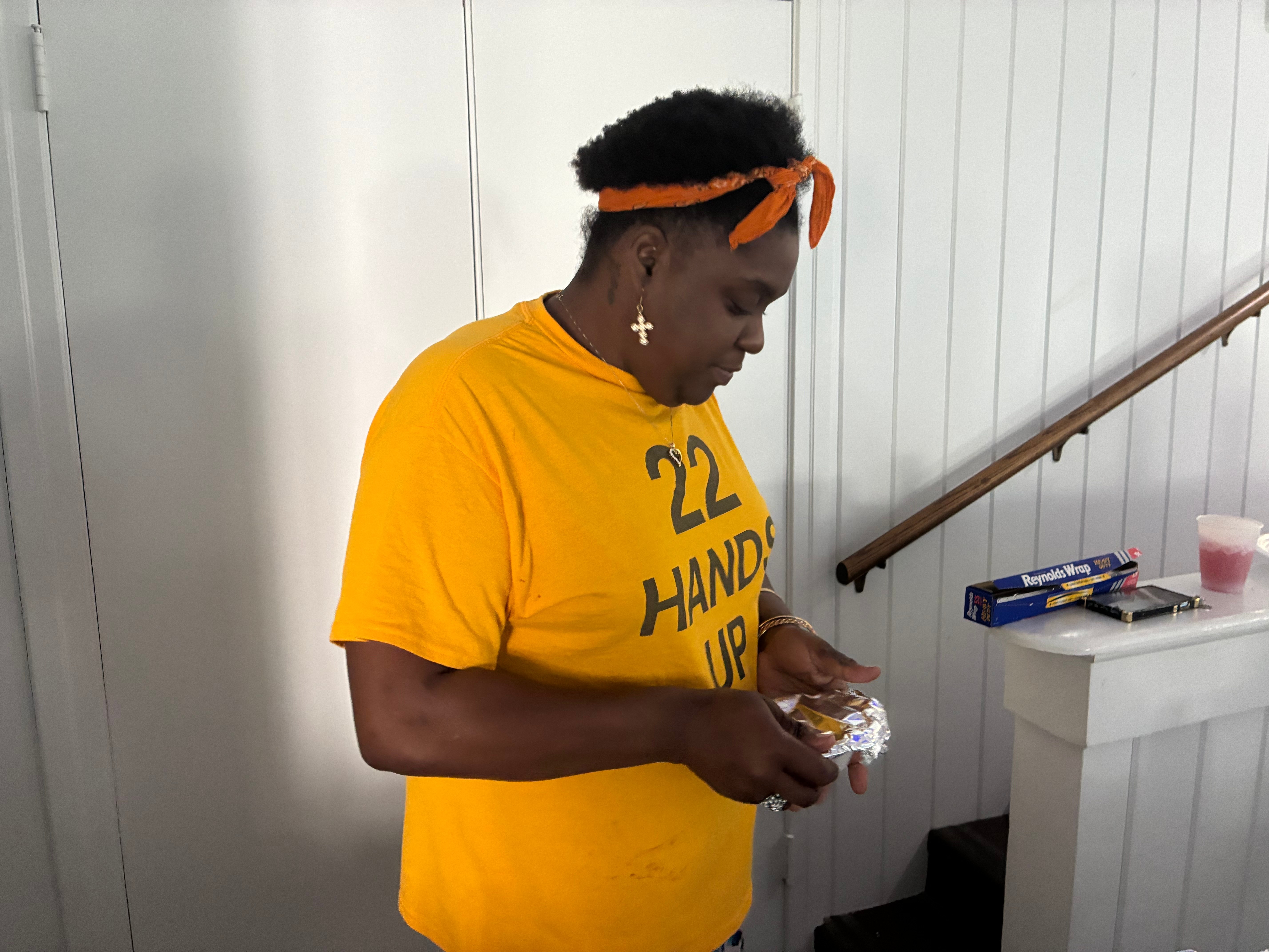 22 Hands Up volunteer preparing food at Food Fest 2025